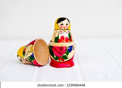 Russian National Nesting Dolls On A White Background