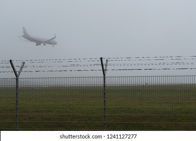 A Russian Passenger Plane A321 Arriving From Moscow In Heavy Fog In Hanover, Germany - Flight Control System And  Runway Light
