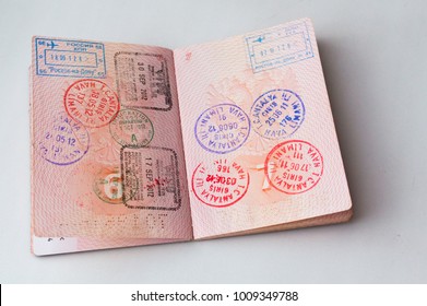 Russian passport stamped on border crossing. Departure and arrival immigration stamps