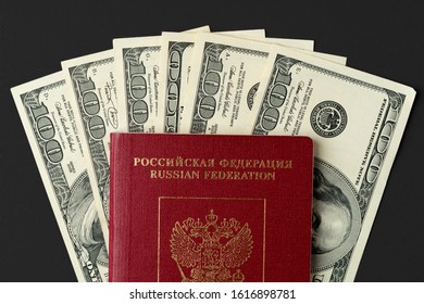 Russian Passport With US Dollar Banknotes Inside