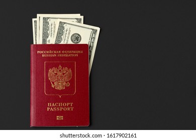 Russian Passport With US Dollar Banknotes Inside