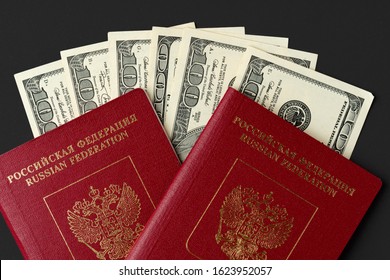 Russian Passport With US Dollar Banknotes Inside