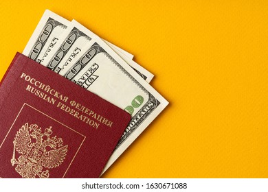 Russian Passport With US Dollar Banknotes Inside