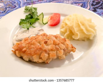 Russian Pozharsky Cutlet , A Breaded Ground Chicken Or Veal Patty That Is Typical For Russian Cuisine .