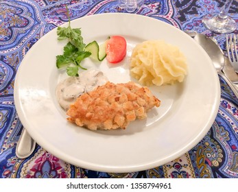 Russian Pozharsky Cutlet , A Breaded Ground Chicken Or Veal Patty That Is Typical For Russian Cuisine .