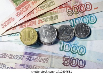 russian roubles banknotes and coins background close up