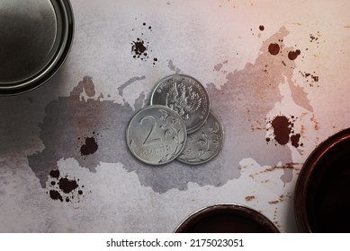 Russian Ruble Coins Surrounded By Buckets Of Oil On The Map Of Russia. Strengthening The Russian Ruble And Increasing Energy Exports Is A Concept