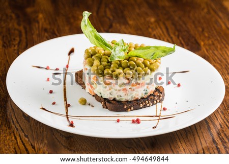 Similar – Traditional Russian salad in bowl. Olivier salad isolated