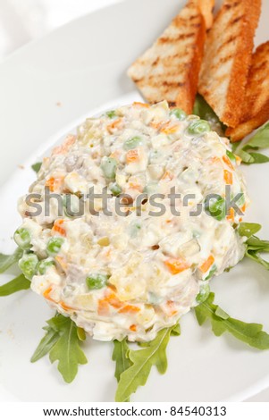 Similar – Traditional Russian salad in bowl. Olivier salad isolated