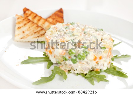 Similar – Traditional Russian salad in bowl. Olivier salad isolated