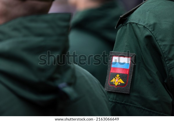 Russian soldiers. Russian army recruits. Russia\
Ministry of Defence emblem. Military chevron. Soldier uniform.\
Military service\
officers