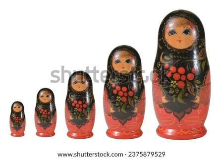 Russian traditional nesting doll set called Matrushka or Babushka isolated on pure white.