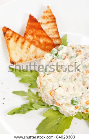 Similar – Traditional Russian salad in bowl. Olivier salad isolated