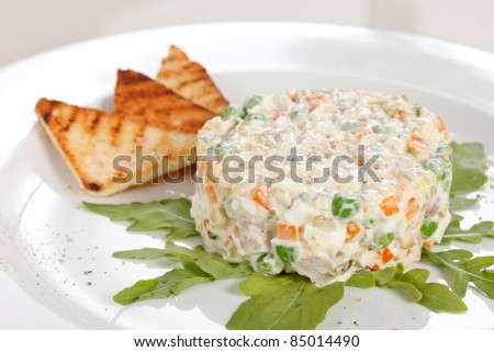 Similar – Traditional Russian salad in bowl. Olivier salad isolated