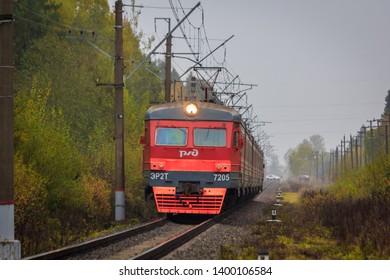 Russian train goes by rail outside the city. Public transport. . Russia Leningrad region, Gatchina district October 7, 2018 - Shutterstock ID 1400106584