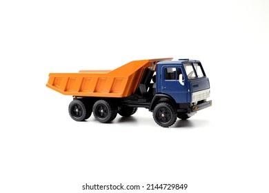 Russian truck KAMAZ. Miniature replica of a car isolated on a white background.