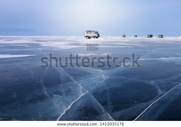 Russian Vans On Frozen Lake Baikal Stock Photo Edit Now