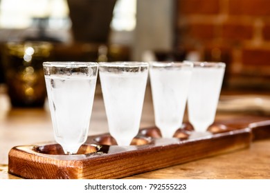 Russian Vodka Into The Frozen Shot Glasses