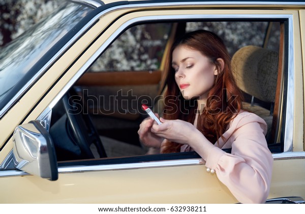   Russian woman driving vintage car                     \
        