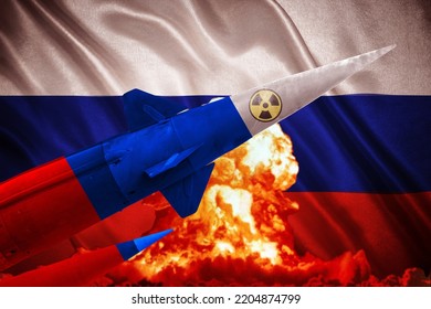 Russia's nuclear missile threat.Mushroom cloud in front of the flag of Russia. The missile is painted in Russian colors. Nuclear explosion.