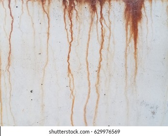 Rust Dripping Down Cement Wall