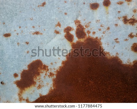 Rust is an iron oxide, a usually red oxide formed by the redox reaction of iron and oxygen in the presence of water or air moisture. Several forms of rust are distinguishable both visually and by spec
