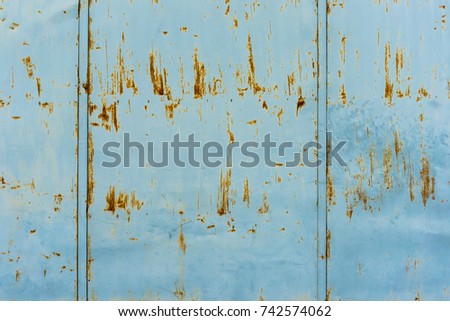 Rust on the blue wall.