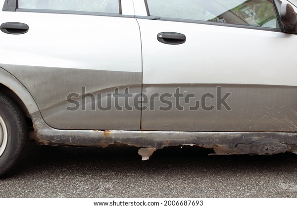 rust on the body of a\
car