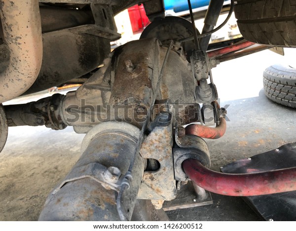 Rust on car repair in shop\
