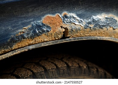 Rust on an old car over the wheels. Horizontal photo - Shutterstock ID 2147550527