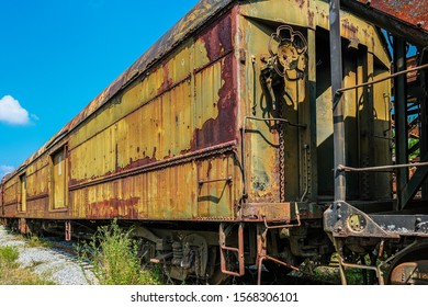 Rust on Yellow Train in Abandoned Yard
