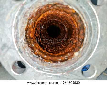 Rust in the pipe. Rust in water pipe. Dirty pipe.