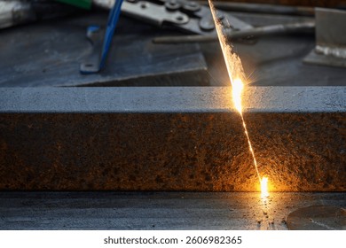  The rust removing on the square shape pipe by laser cleaner machine. Close up scene rust cleaning process by portable laser cleaning machine.