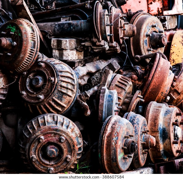 Rust wheel\
parts , The rust car parts in junkyard.\
