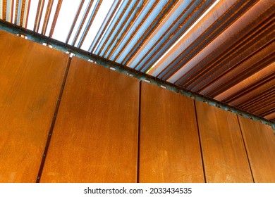 
Rust-coated sheet metal forming an abstract image, corten panel and louvers