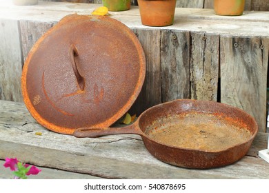 Rusted Cast Iron Pan On Rust Background, Selective Focus.effect 