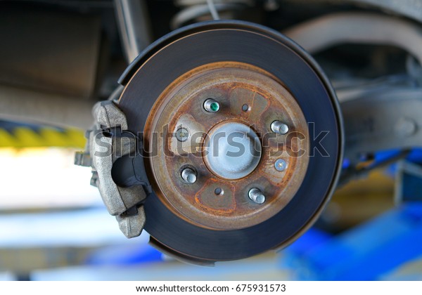 rusted disc brake ,\
caliper , wheel stud 