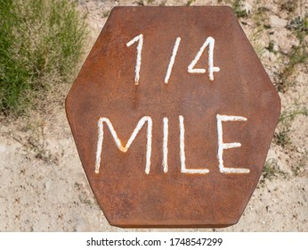 Rusted Hexagon Shaped Hiking Trail Mile Marker