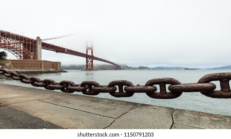 Rusted Iron Chain with the Golden gate bridge in backgroud - Powered by Shutterstock