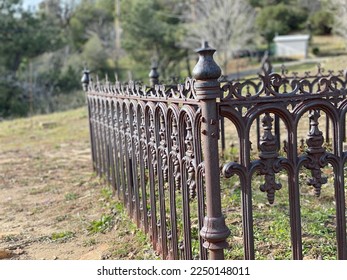 Rusted Iron Gate in Cemetery