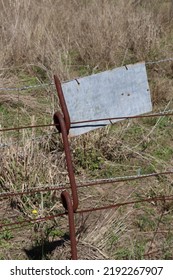 Rusted Metal Joiner On Electric Fence