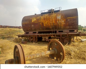 Rusted Old , Decommissioned Freight Wagons Which Were Used To Transport Furnace Oil , At Railway Junkyard 