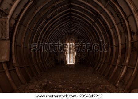 Rusted underground bunker passage tunnel