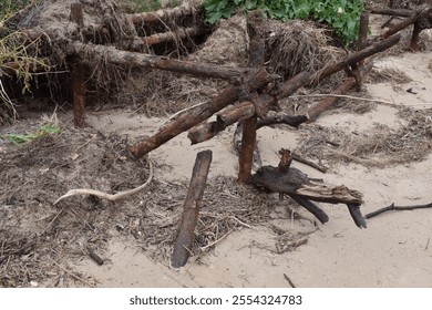 Rusted World War 2 era coastal defences at Gibraltar Point, Skegness, Lincolnshire.  Remains of anti-landing scaffolding, designed to hinder invasion by boat.  Detail of rusted metal.  October 2023. - Powered by Shutterstock