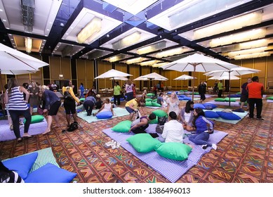 Rustenburg North West South Africa 03 27 2011 People Having A Indoor Picnic With Blankets Pillows And Umbrellas 