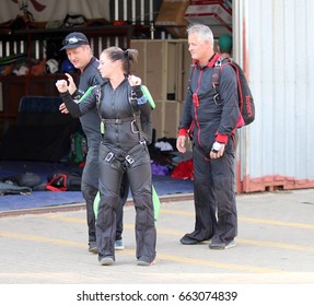 RUSTENBURG, SOUTH AFRICA - April 28, 2017: National Skydiving Championships. Sky Divers Practising In Air Formation And Artistic Manoeuvres And Sequences On Ground 