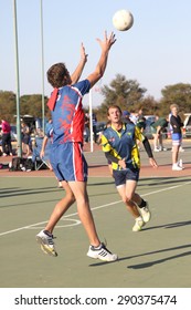 RUSTENBURG, SOUTH AFRICA - June 6:  Korfball League games played at Olympia Park on June 6, 2015 in Rustenburg South Africa.  Mens team:  Man catching ball.