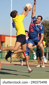 RUSTENBURG, SOUTH AFRICA - June 6:  Korfball League games played at Olympia Park on June 6, 2015 in Rustenburg South Africa.  Mens team:  Man blocking throw.