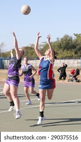 RUSTENBURG, SOUTH AFRICA - June 6:  Korfball League games played at Olympia Park on June 6, 2015 in Rustenburg South Africa.  Ladies team:  Girls competing for ball.