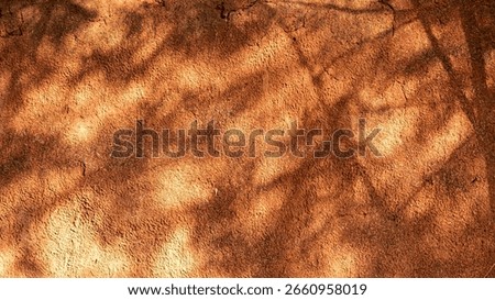 Rustic background with a warm, earthy texture. The background features rich brown tones with subtle shadows, creating a natural, organic feel. Autumn desktop wallpaper, autumn season vibes.